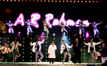 Dancers perform with Rahman