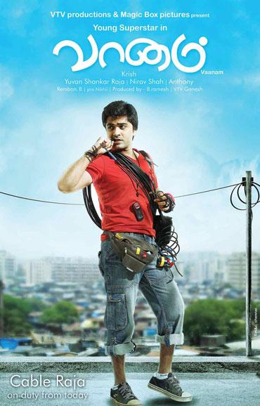 A poster of Vaanam