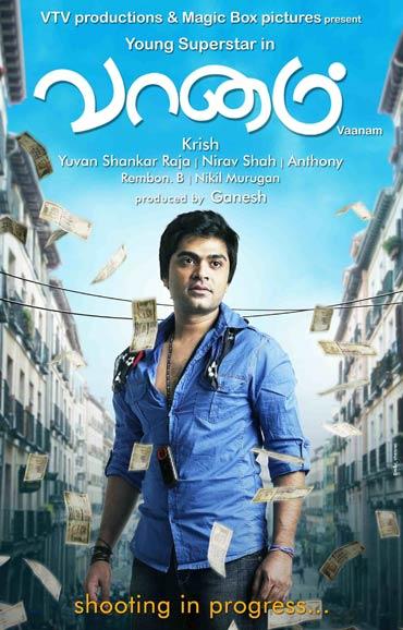 A poster of Vaanam