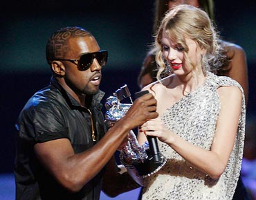 Kanye West takes the microphone from best female video winner Taylor Swift