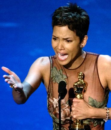 Halle Berry reacts to winning the Oscar for Best Actress during the 74th Academy Awards