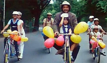 Anil Kapoor rides with Tina, and the other children