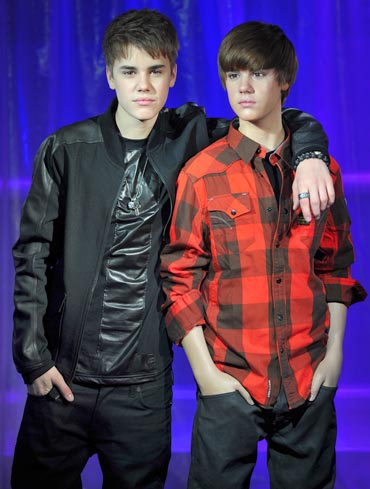Justin Beiber with the waxwork model