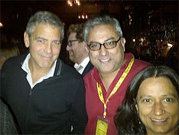 George Clooney and Aseem Chhabra with a friend