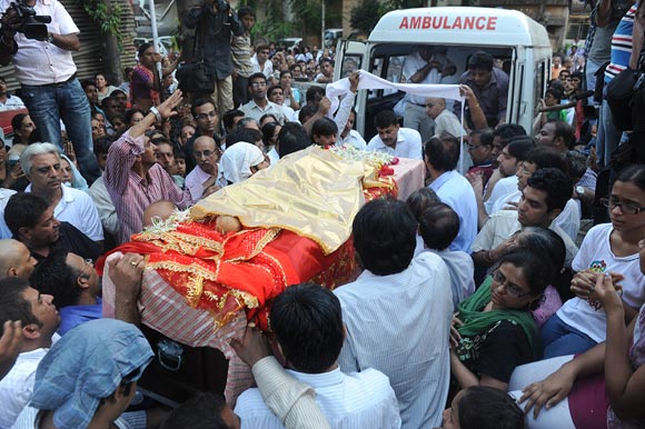 Family and friends gather around Taruni Sachdev's body