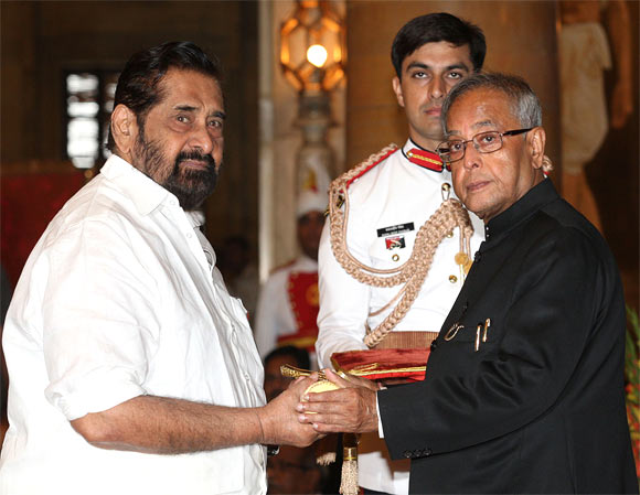 Madhu receiving the Padmashree award from President Pranab Mukherjee