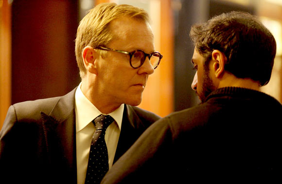 Kiefer Sutherland and Riz Ahmed in The Reluctant Fundamentalist