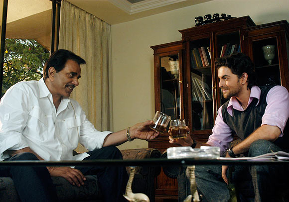 Dharmendra and Neil Nitin Mukesh in Johnny Gaddaar