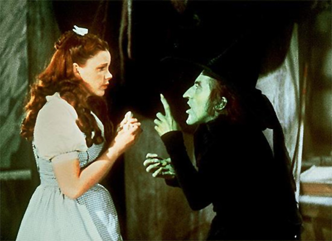 Judy Garland and Margaret Hamilton in Wizard of Oz