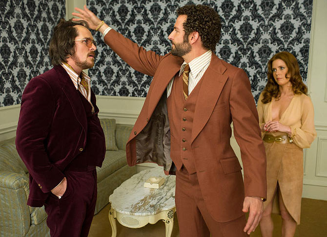 Christian Bale, Bradley Copper and Amy Adams in Amercian Hustle