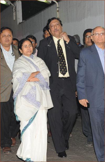 This file photograph shows West Bengal Chief Minister Mamata Banerjee (second from left) along with Dr Subrata Maitra (third from left) at Belle Vue nursing home where actress Suchitra Sen was admitted.