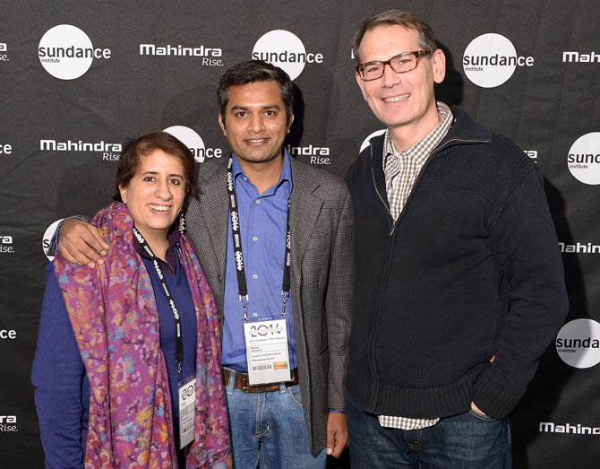 From left, filmmakers Guneet Monga, Neeraj Ghaywan and a guest attend the Sundance Institute Mahindra Global Filmmaking Award Reception.
