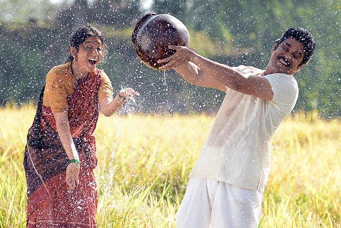 Shriya Saran and Nagarjuna in Manam