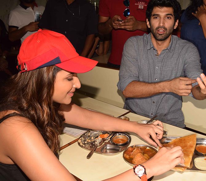 Aditya Roy Kapoor and Parneeti Chopra at Madras Cafe, Matunga.
