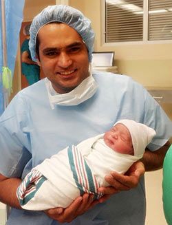 Asad Bashir Khan with his baby