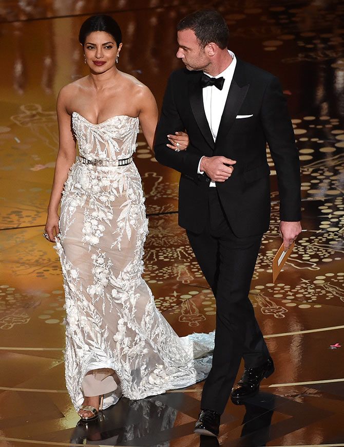 Priyanka Chopra with Liev Schreiber at the Oscars. Photograph: Kevin Winter/Getty Images
