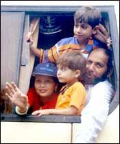 A Lahore-bound family. Pic: Getty Images