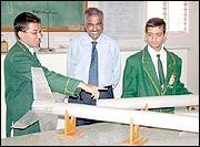 Dhanvi Reddy, Dr Abraham Ebenezer, Chandan Prasad. Photo: PTI (Click for larger image)