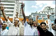 Supporters of an Islamic organisation shout anti-US slogans in Dhaka
