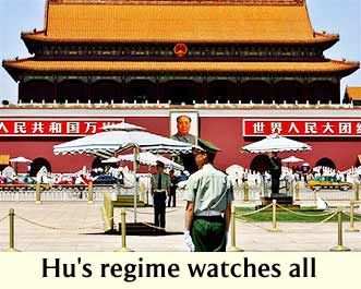 Chinese soldiers stand guard on Tiananmen Square on the eve of the 16th anniversary since the bloody crackdown on the square in Beijing Friday, June 3, 2005. (AP Photo)