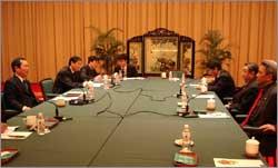 Special Envoy Kasur Lodi Gyari, (center right) Envoy Kelsang Gyaltsen and senior assistant Sonam N. Dagpo meet Chinese Exective Vice Minister Zhu Weiqun of the United Front Work Department of the Chinese Communist Party, Sithar, head of the Second Bureau in the United Front, and others during the fifth round of talks in Guilin City on February 22, 2006.