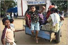 Sri Lankan Tamil refugee children arrive at the Sacred Heart Church in Mutur, near Trinconamalee, Sri Lanka