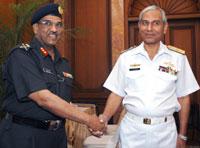 Major General M Gopal Rao, Surveyor General of India (left) with Rear Admiral Ahsanul-Haq-Chaudri, Additional Secretary, Defence, Pakistan prior to the the Indo-Pak delegation level talks on Sir Creek, in New Delhi, on May 25.