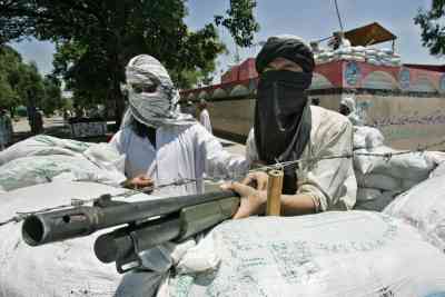 Militant students of the Lal Masjid take aim as they exchange fire with security forces.