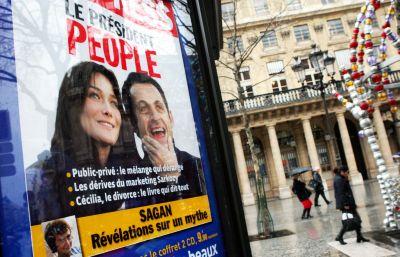 The cover of L'Express news magazine, titled 'The president people', shows French President Nicolas Sarkozy with Italian singer Carla Bruni