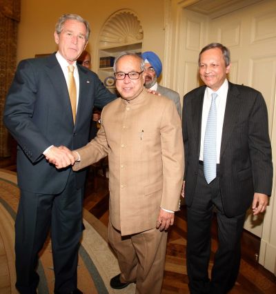 US President George W Bush with External Affairs Minister Pranab Mukherjee and Indian Ambassador Ronen Sen.