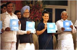 United we stand: T R Baalu, Dr Manmohan Singh, Sonia Gandhi and Lalu Yadav after the UPA released its 4th year report card