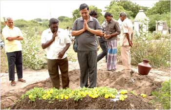 Sreedhar, giving a burial to 17 unclaimed bodies