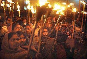 Local activists attend a rally to mark the 25th anniversary of the Bhopal gas disaster