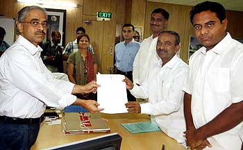 TRS legislators submit a memorandum to Anti-corruption Bureau Chief Arvind Rao, seeking the arrest of Irrigation Minister Punna lakshmaih for the recent man-made flood situation in Telangana