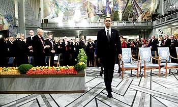 Barack Obama enters the Nobel Peace Prize ceremony at the City Hall in Oslo