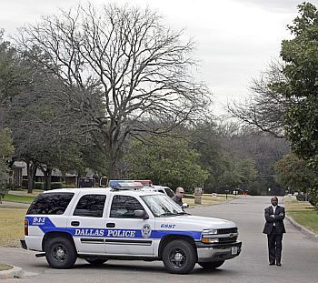 File photo shows Dallas cops stationed outside the Bush residence