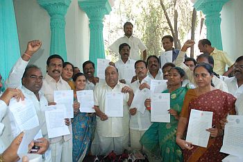 TDP and Congress MLAs showing their resignation letters