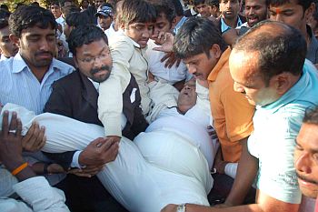 TDP MLA N Janardhan Reddy being taken to the hospital after being attacked by protestors