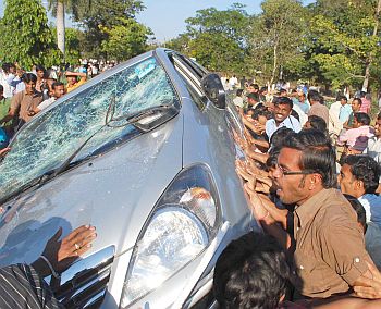Students vent their anger on parked vehicles