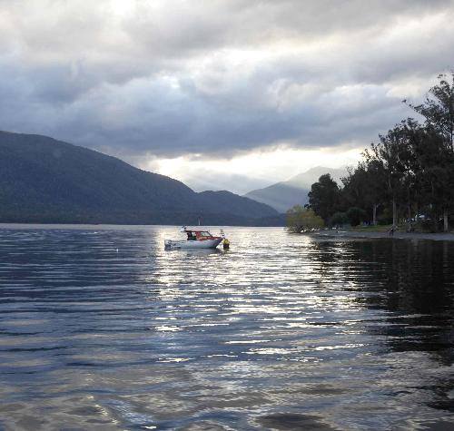 Rain clouds gather over Lake Te Anau on the south island of New Zealand