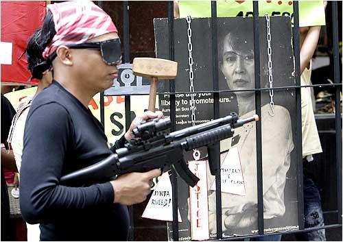 Members of the Free Burma Coalition-Philippines hold a protest