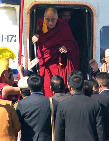 Dalai Lama embarks from the helicopter