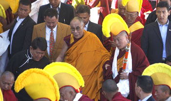 Dalai Lama waves to the crowd at Tawang