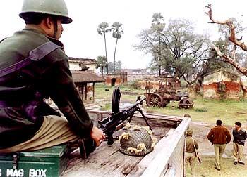 Security personnel keep watch at a Maoist-infested village in Bihar