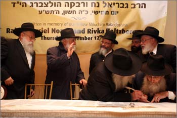 Rabbis Shimon Rosenberg and Nachman Holtzberg.