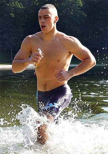 A soldier undertakes fitness training at a military camp