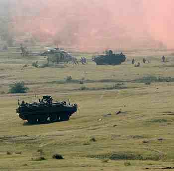 2nd squadron, 14th Cavalry Regiment, 'Strykehorse,' 2nd Stryker Brigade Combat Team, 25th Infantry Division and Indian Army's 7th Mechanized Infantry Battalion, 94th Armored Brigade, 31st Armored Division perform a medical evacuation during a combined arms live fire exercise