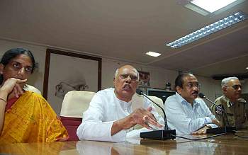 Finance Minister K Rosiah addresses media persons along with Chief Secretary Ramakanth Reddy