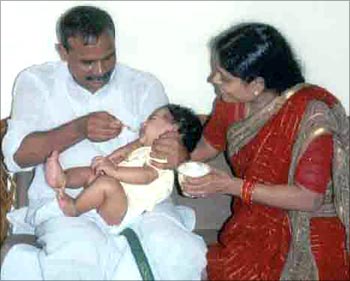 YSR and his wife, with their grandchild