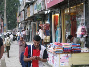 Kashmiris step out at Lal Chowk after nine days of curfew